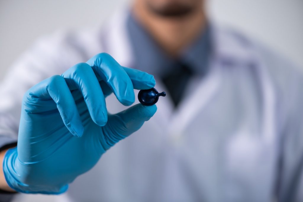 a doctor holding a glove