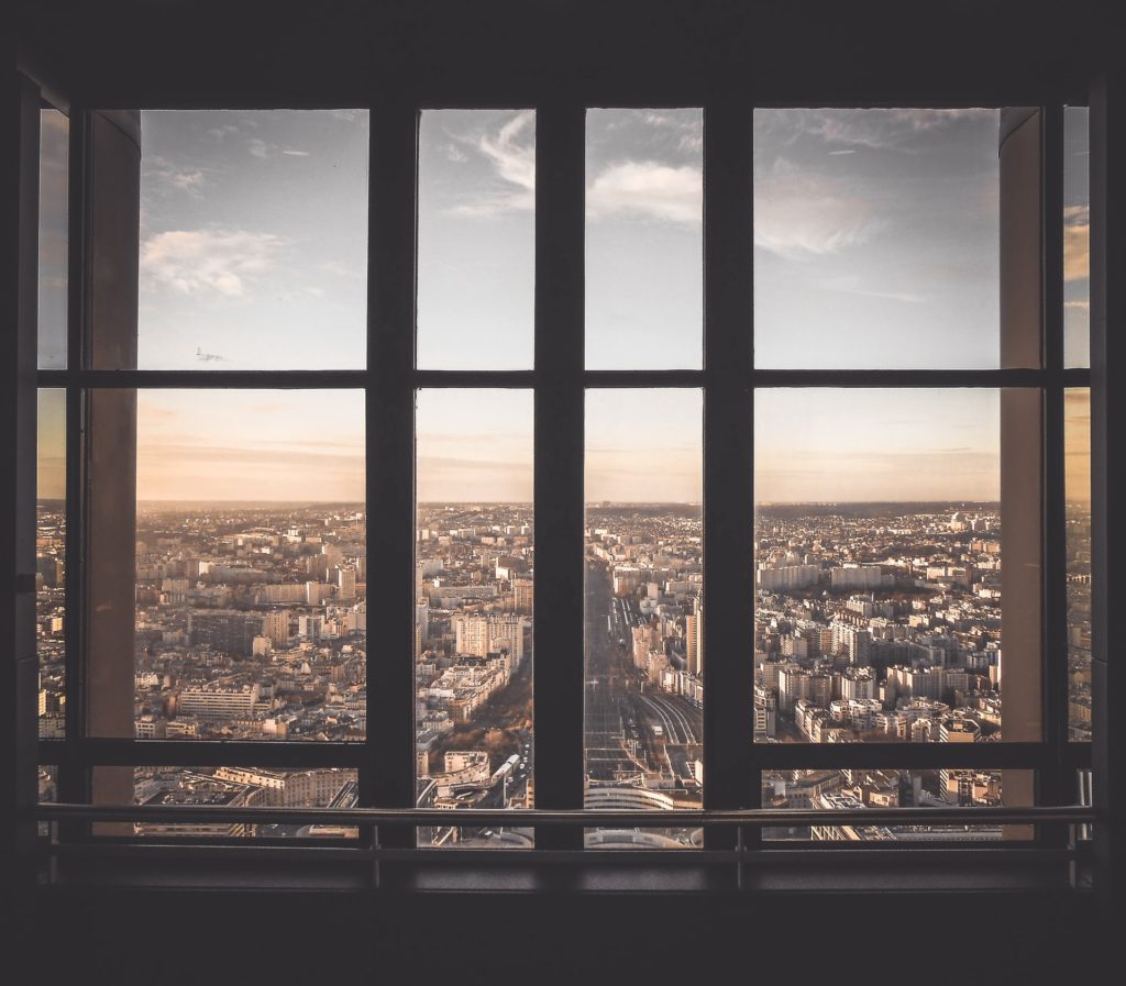 a view of a city through a window