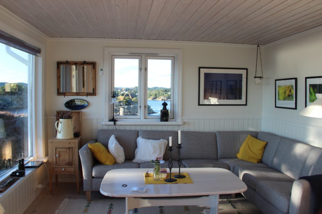 a living room with a couch and a table