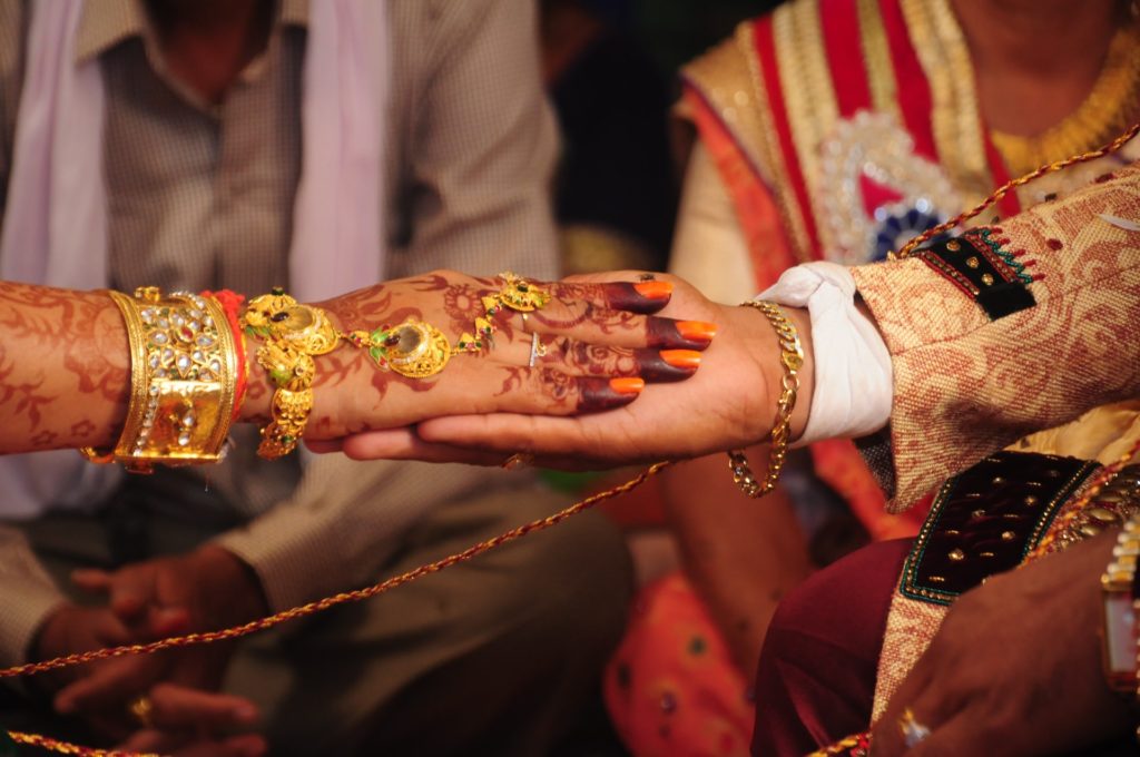 a close-up of people shaking hands