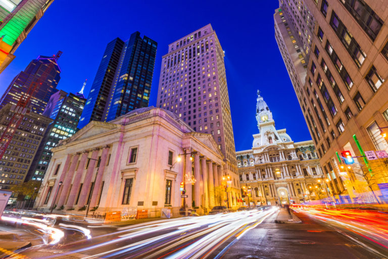 a city street with tall buildings