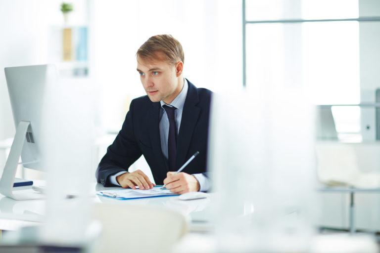 a man sitting at a desk