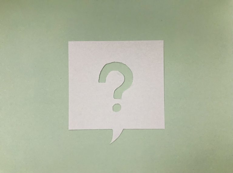 paper cut out with a question mark