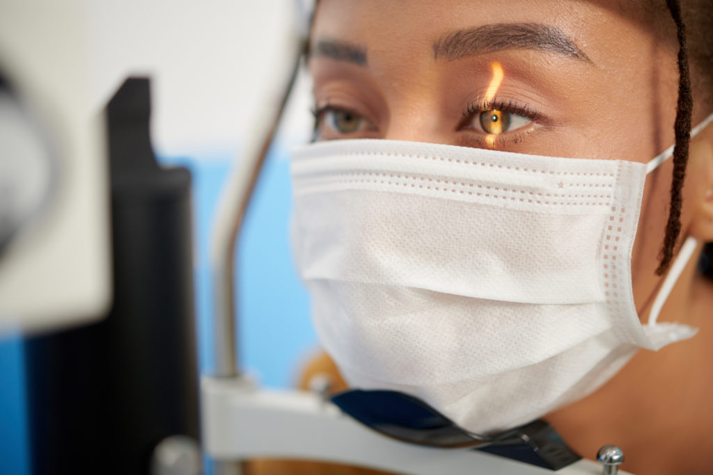 Woman Having Back of Eye Examined