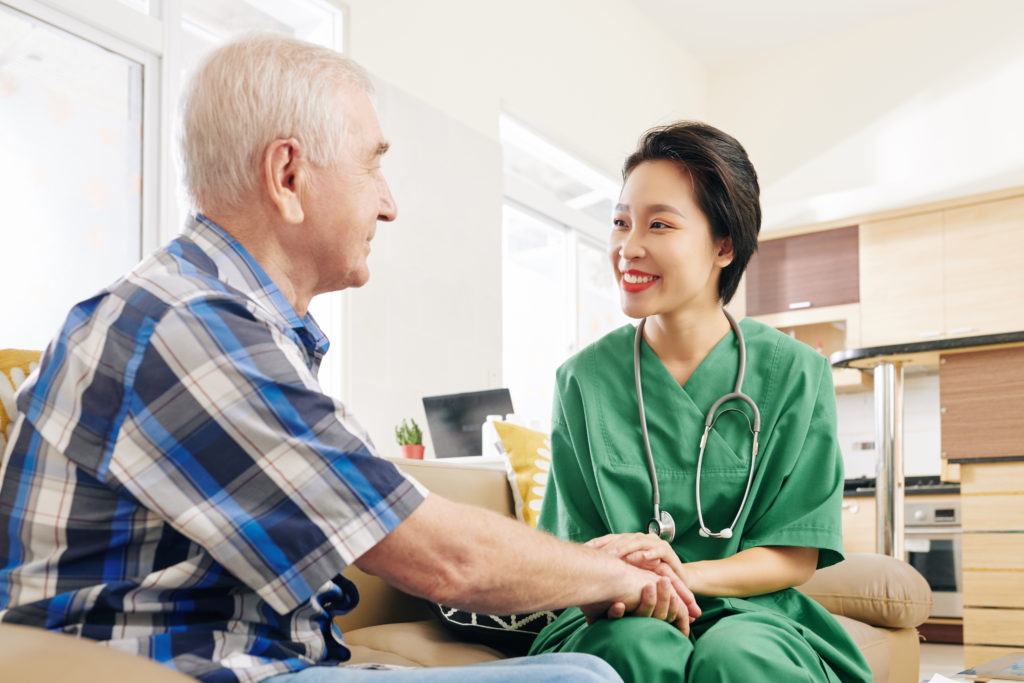 Nurse reassuring patient