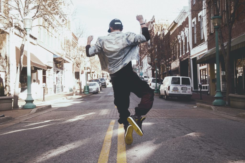 a man jumping in the air on a skateboard